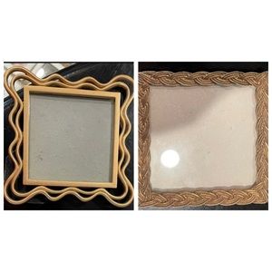Two Golden Picture Frames.